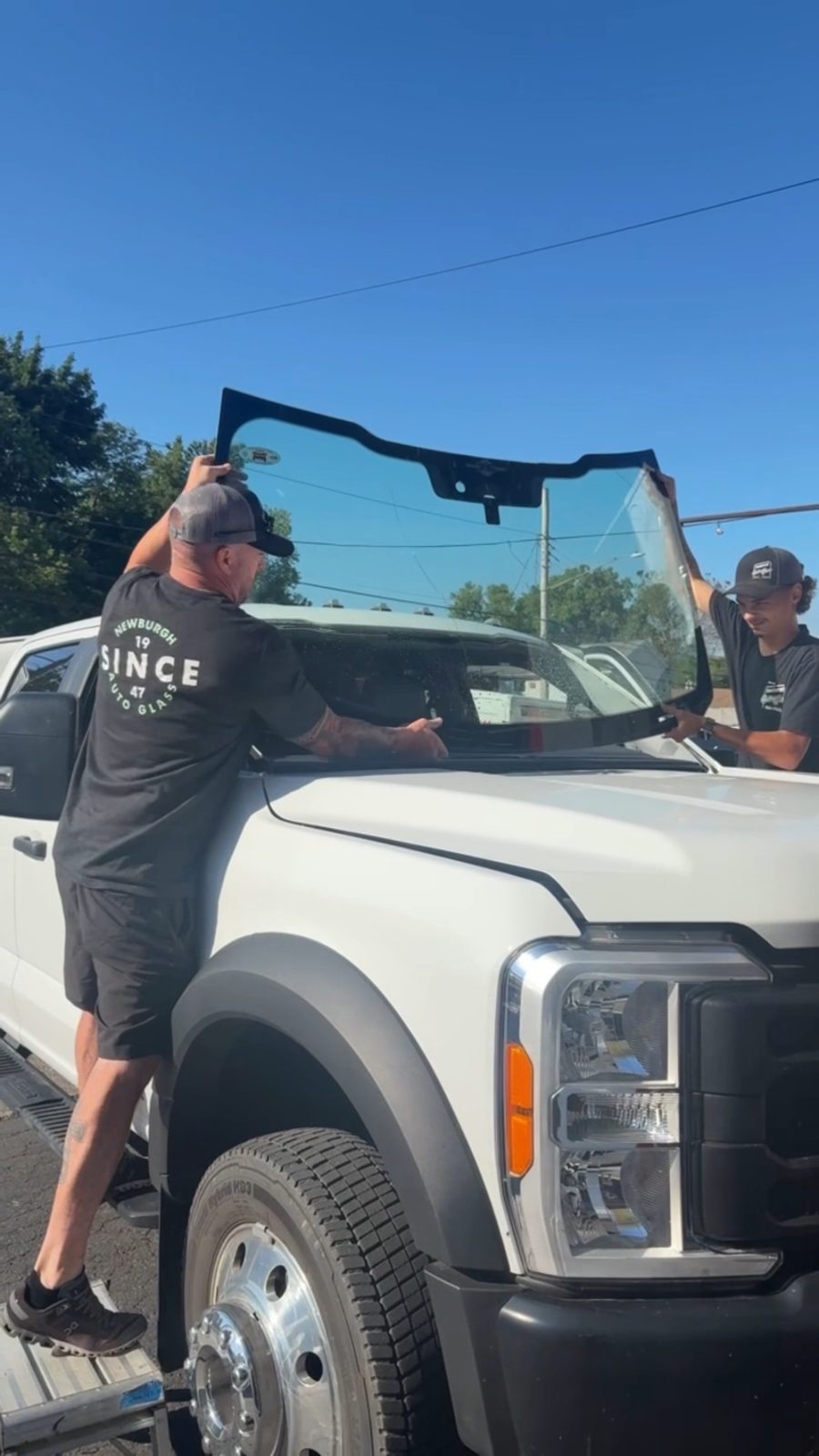 Newburgh Auto Glass technician replacing a Ford Super Duty windshield